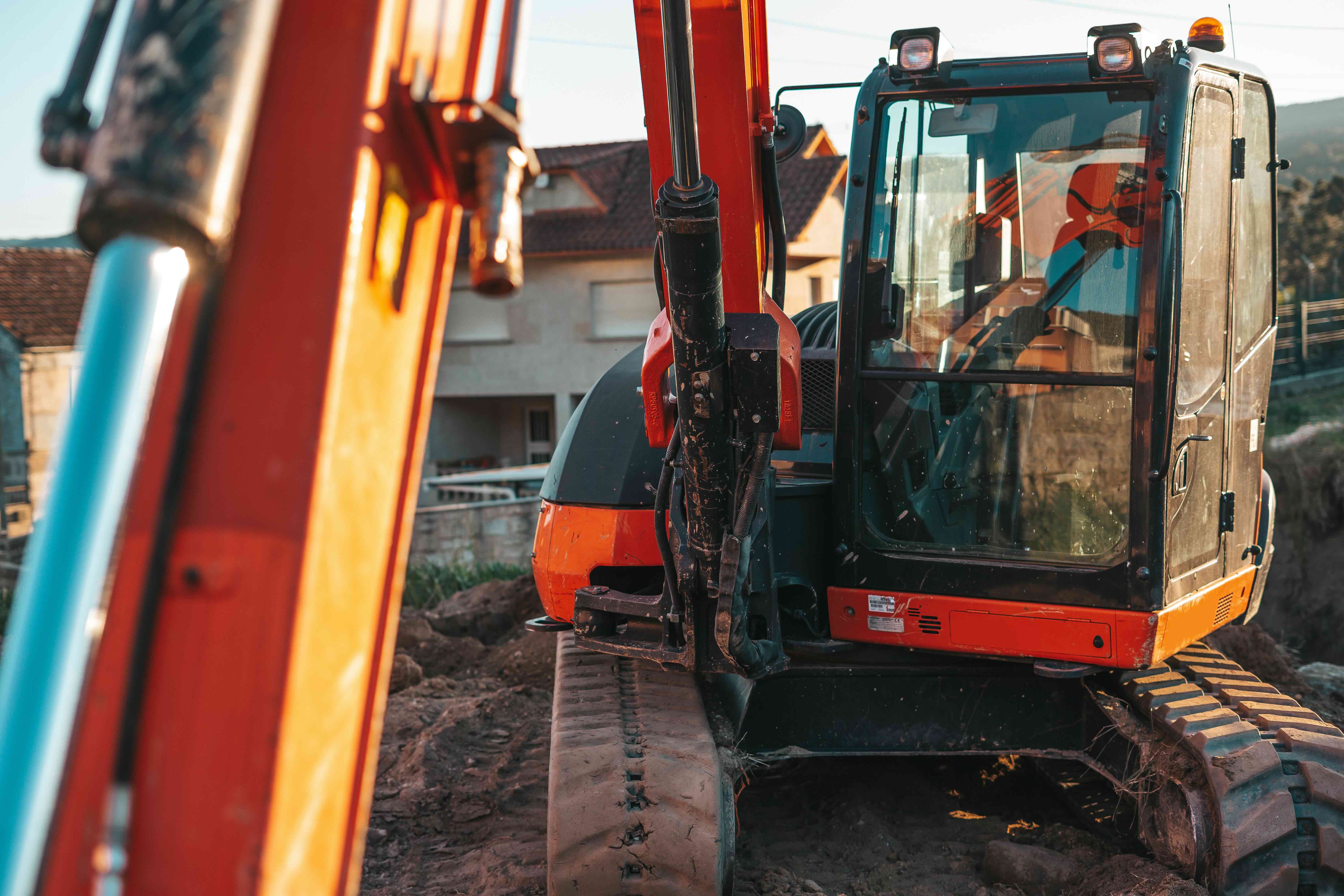 Hydraulic cylinders and lines on an excavator